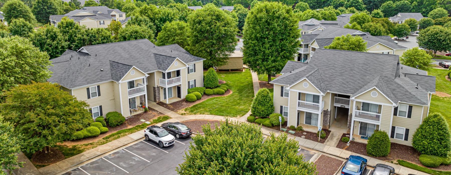 Exterior view of Fieldstone Apartment Homes with parking in Alamance County