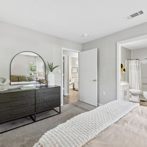 Primary bedroom inside a two‑bedroom apartment at Fieldstone Apartment Homes in Mebane, North Carolina